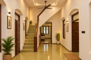 warm symmetrical foyer with staircase